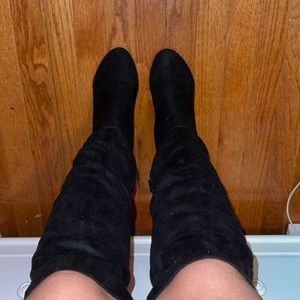 Knee high black suede heeled boots